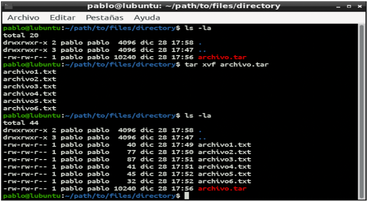 Pantalla de terminal de Linux con comando tar para descomprimir archivos